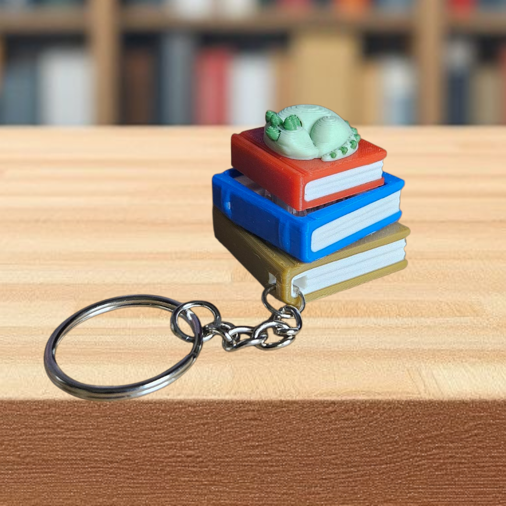 Stack of books keychain clicker